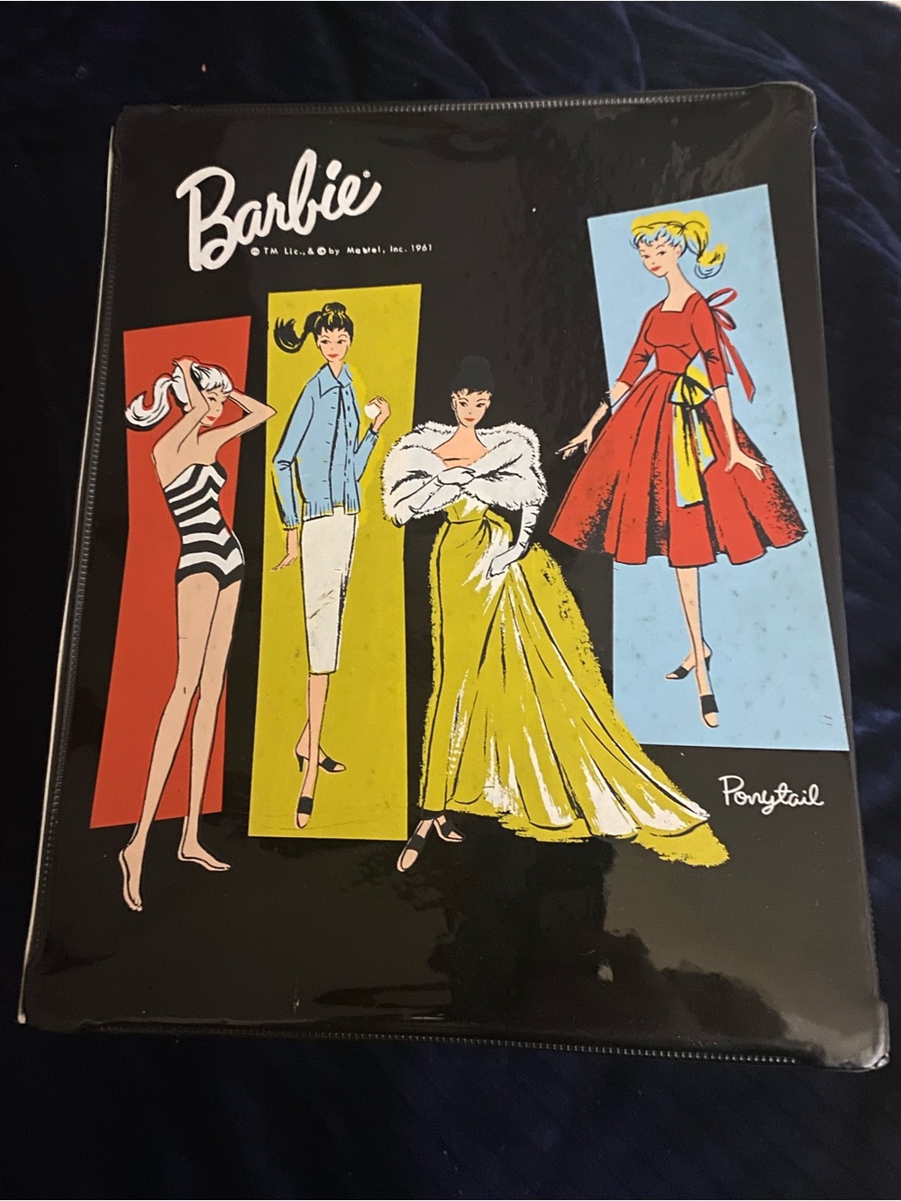 Barbie vintage black vinyl case. Collectible. Comes with vintage Barbie, wigs, .